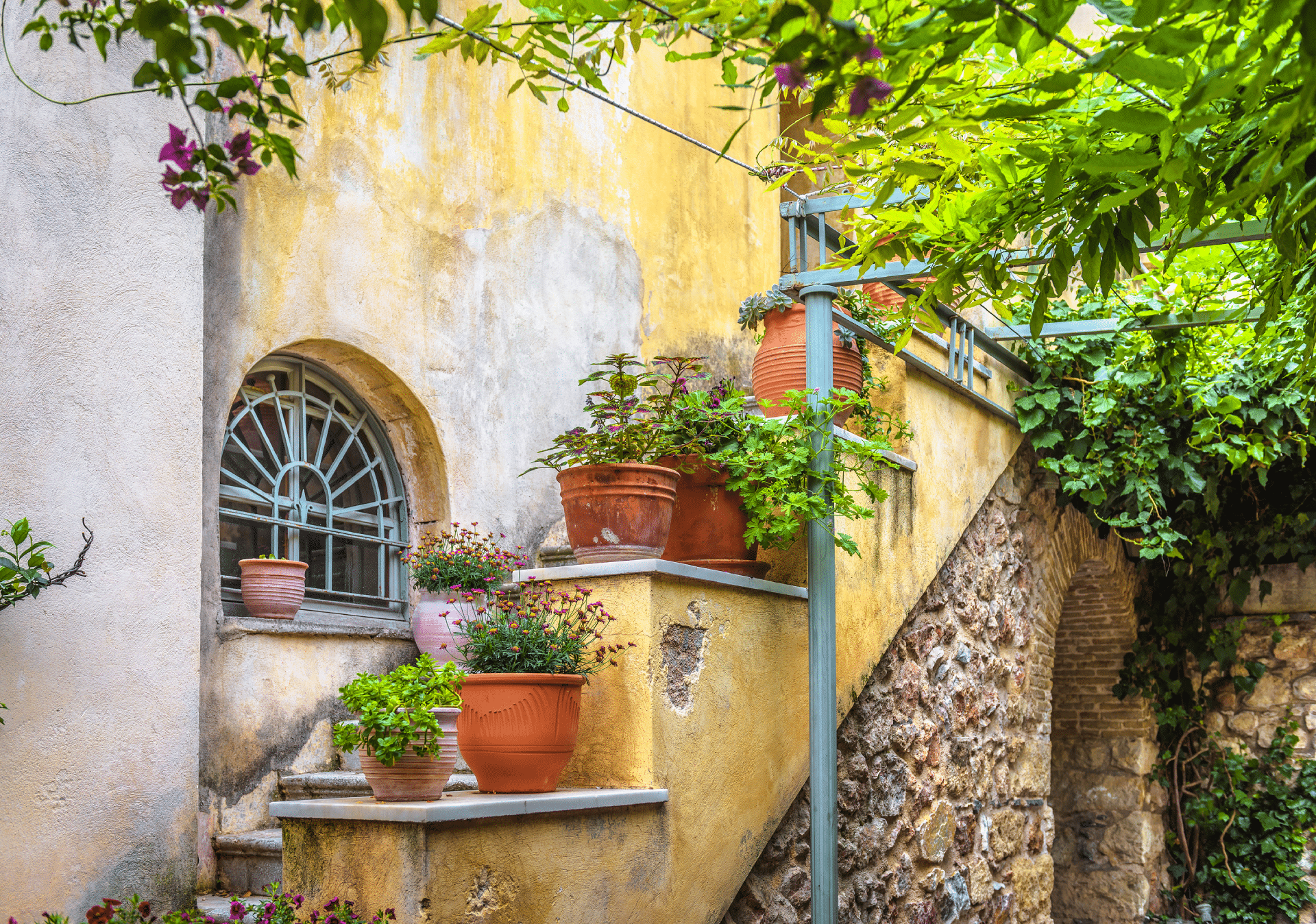 The colourful houses of Plaka district, where ESSE boutique hotel Athens near the Acropolis is located.